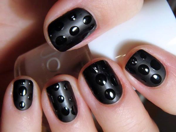 Easy matte black nail art with glossy polka dots
