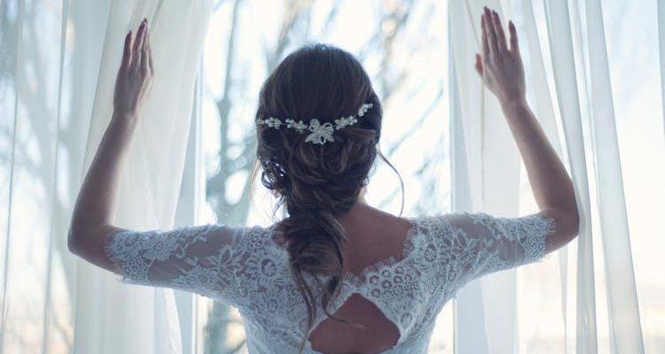 Beautiful bridal hairstyle with intricate details, perfect for a wedding day look.
