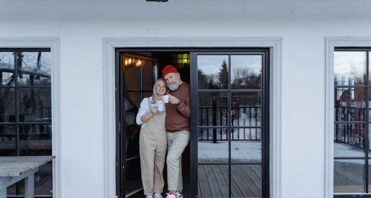 A senior couple enjoying luxury retirement living in a stylish and comfortable residence.