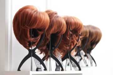Variety of glueless hair wigs on display, showcasing different styles and colors for easy and secure wear.